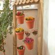 Pot holders for a vertical garden (Article)